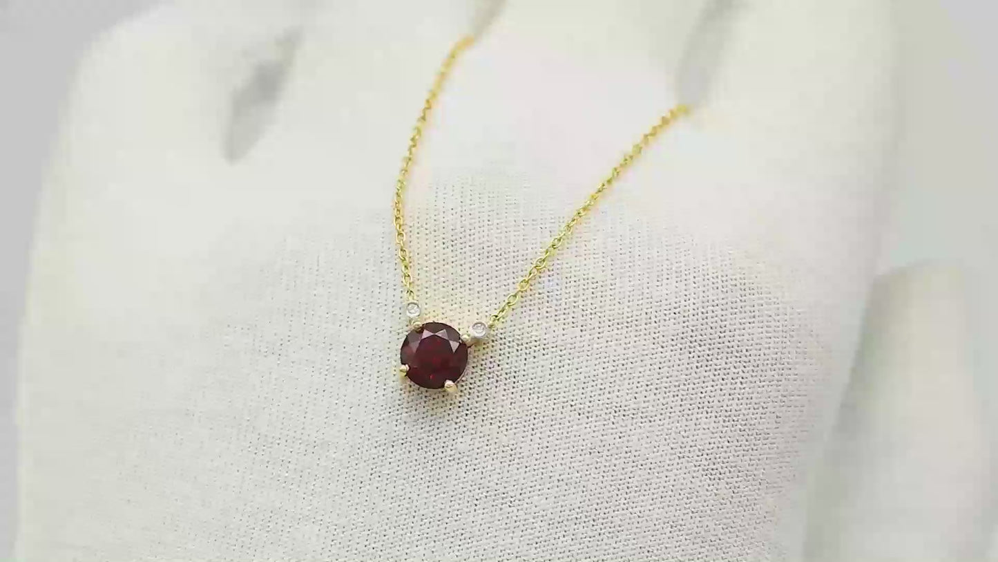 Load and play video in Gallery viewer, Real Red Garnet 1.1Ct Round Gemstone With Diamond Accents In 14k Yellow Gold Pendant
