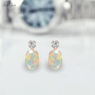 Oval Cut Ethiopian Opal & Real Diamond Accented Stud Earrings In 14K Gold