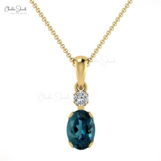 Two Stone Prong Set Charms With 0.47 Ct London Blue Topaz And Diamond Pendant