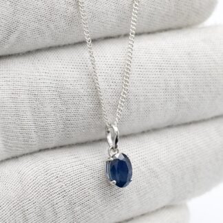 Oval Cut Solitaire Pendant With 7x5mm Blue Sapphire Prong Set In 14k White Gold Necklaces